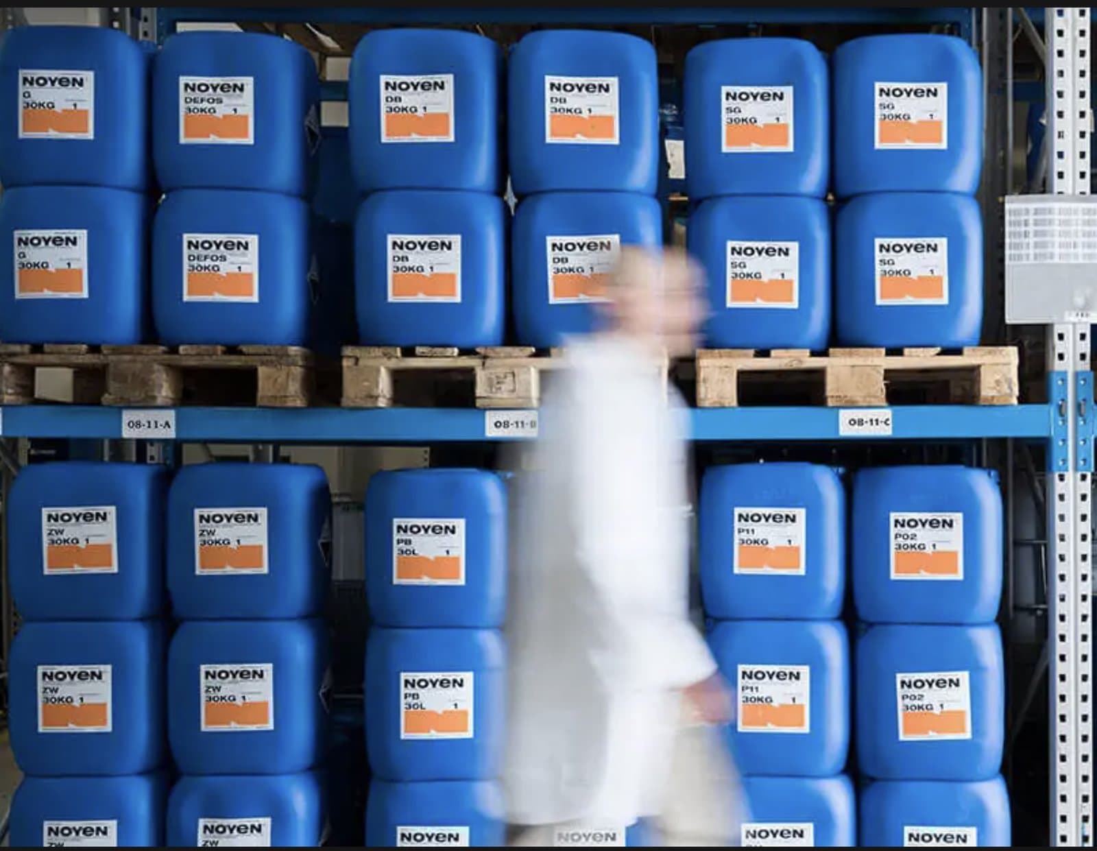 Pallets of Noyen industrial cleaning detergents stacked in a Klarwin warehouse