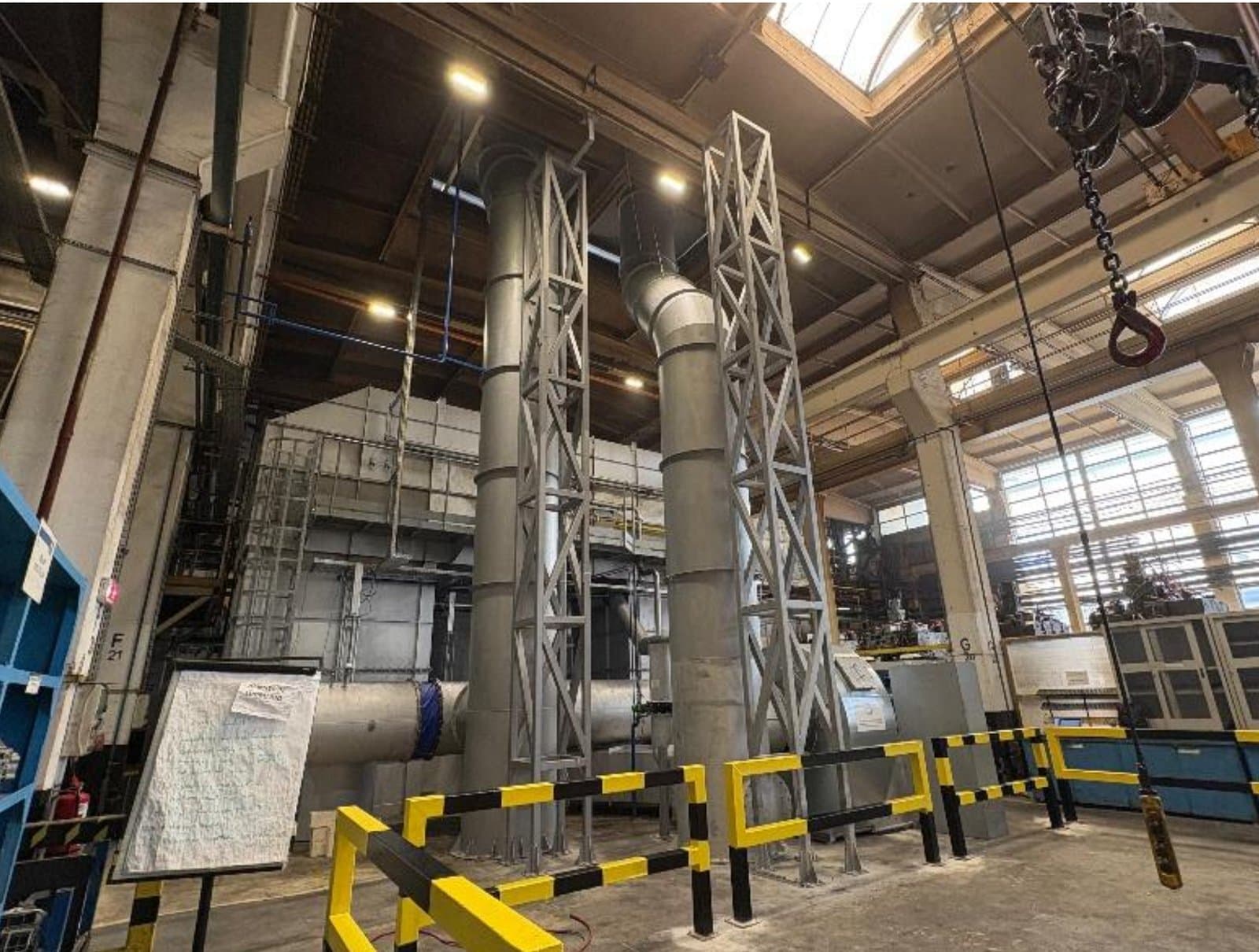 Klarwin RTO installation — twin support structures and stacks inside an industrial hall