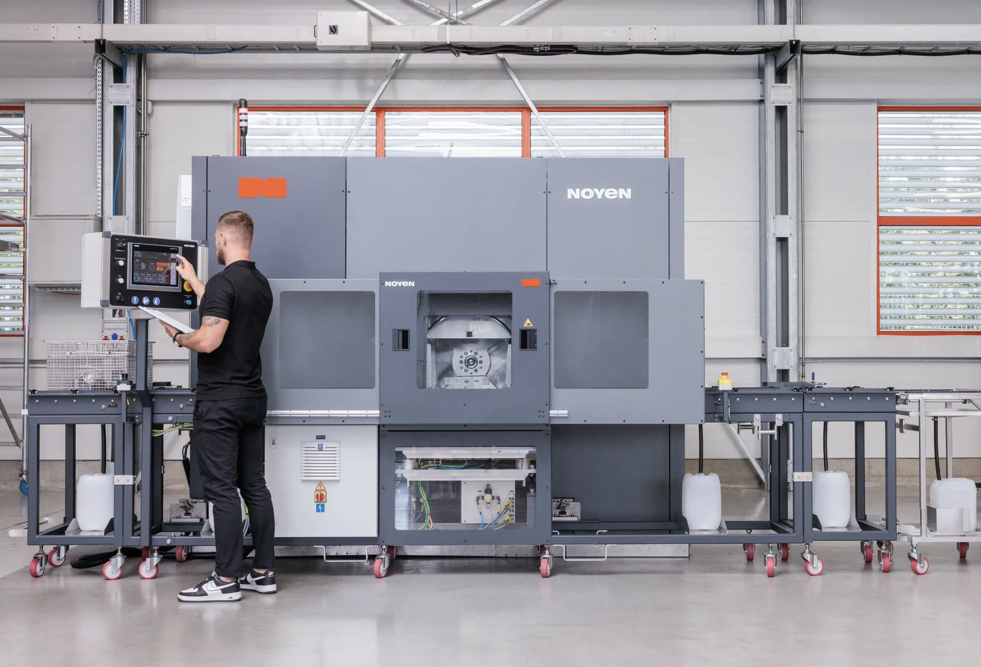 Klarwin operator at a Noyen automated washing line on a factory floor
