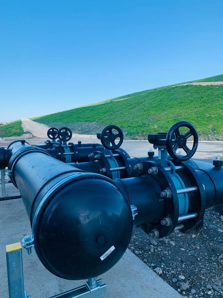 Complete landfill degassing system — wells, collectors, suction stations and flaring