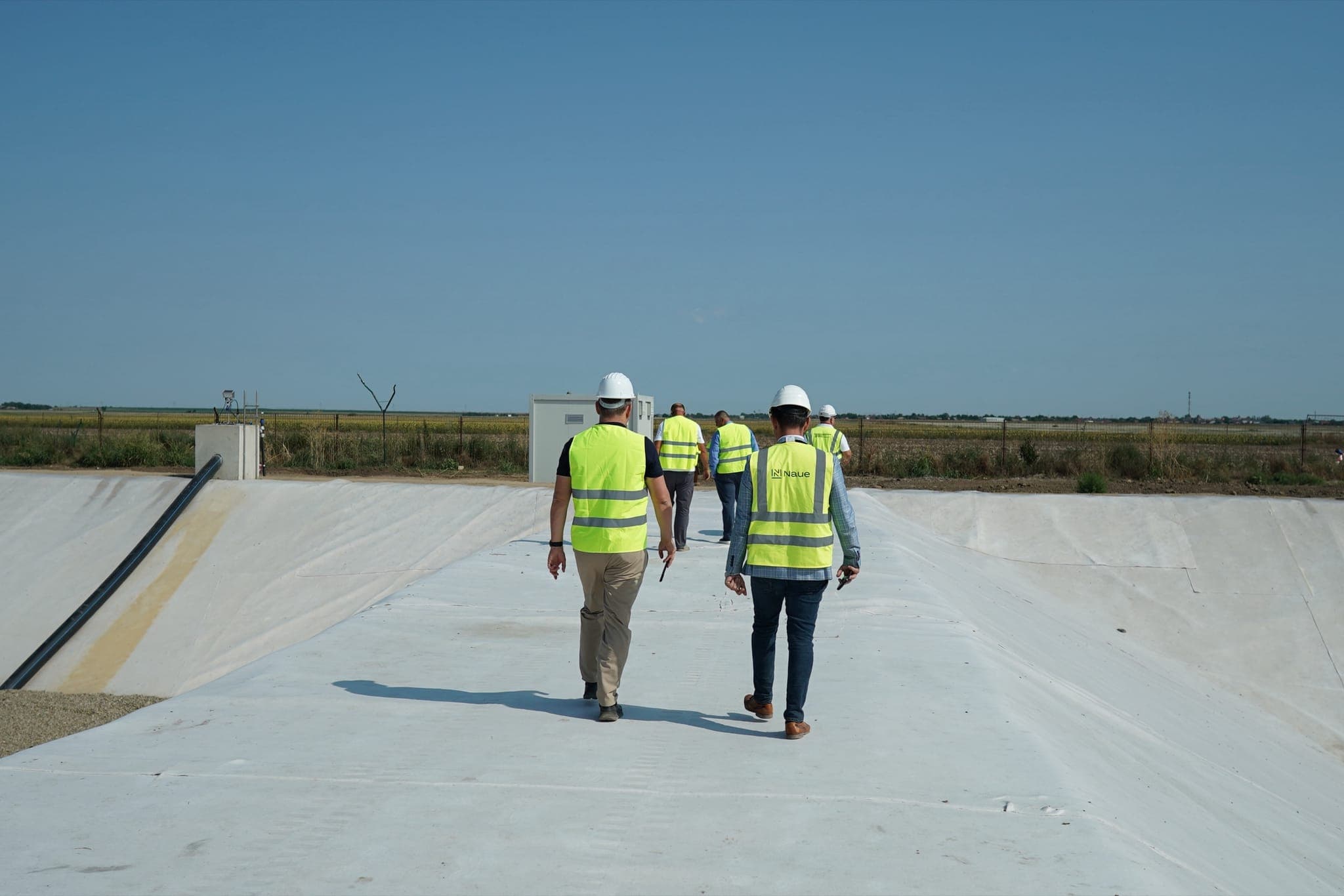NAUE geomembrane installation with automatic welding at landfill cell