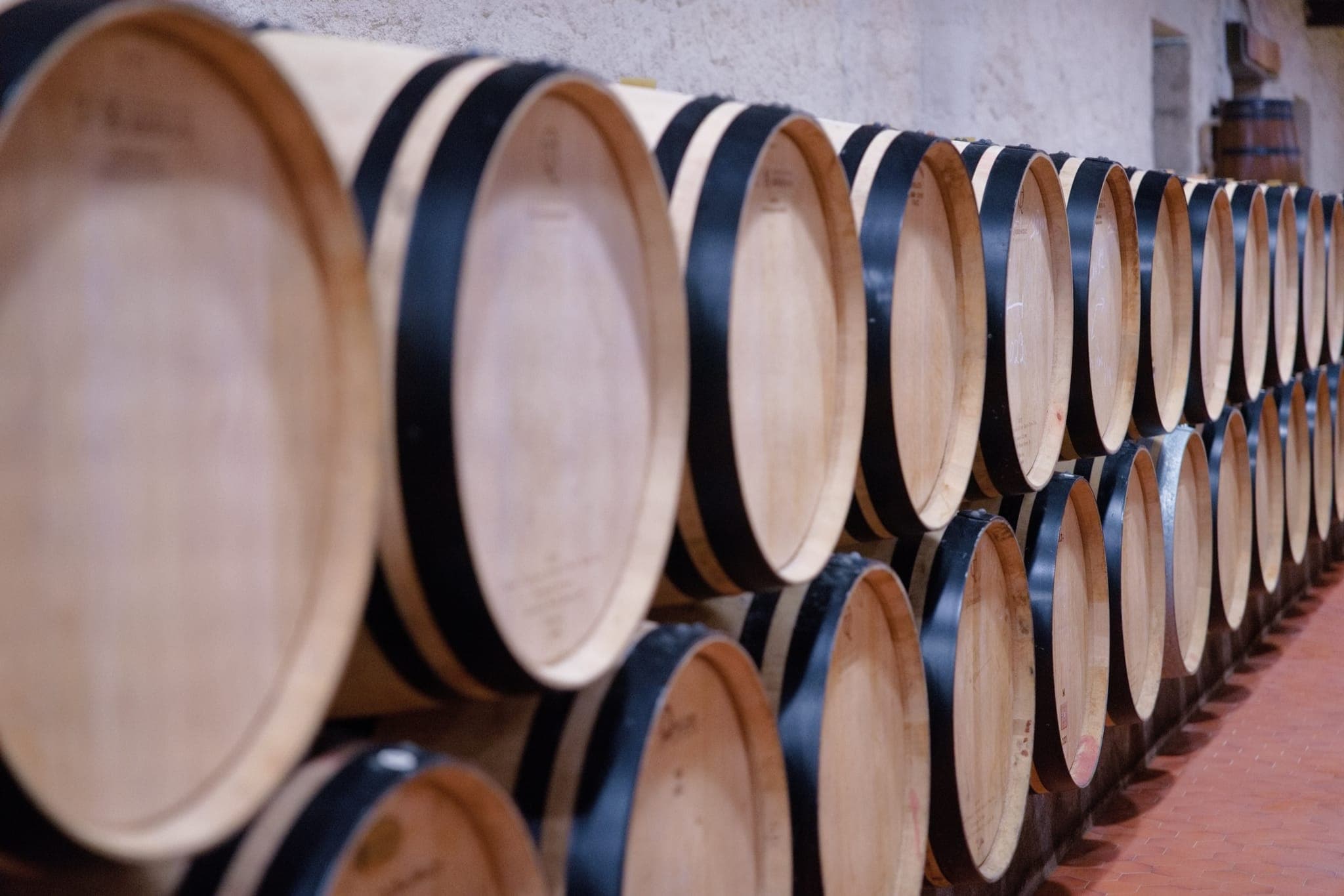 French oak barrels in wine cellar — Klarwin maturation and wood solutions
