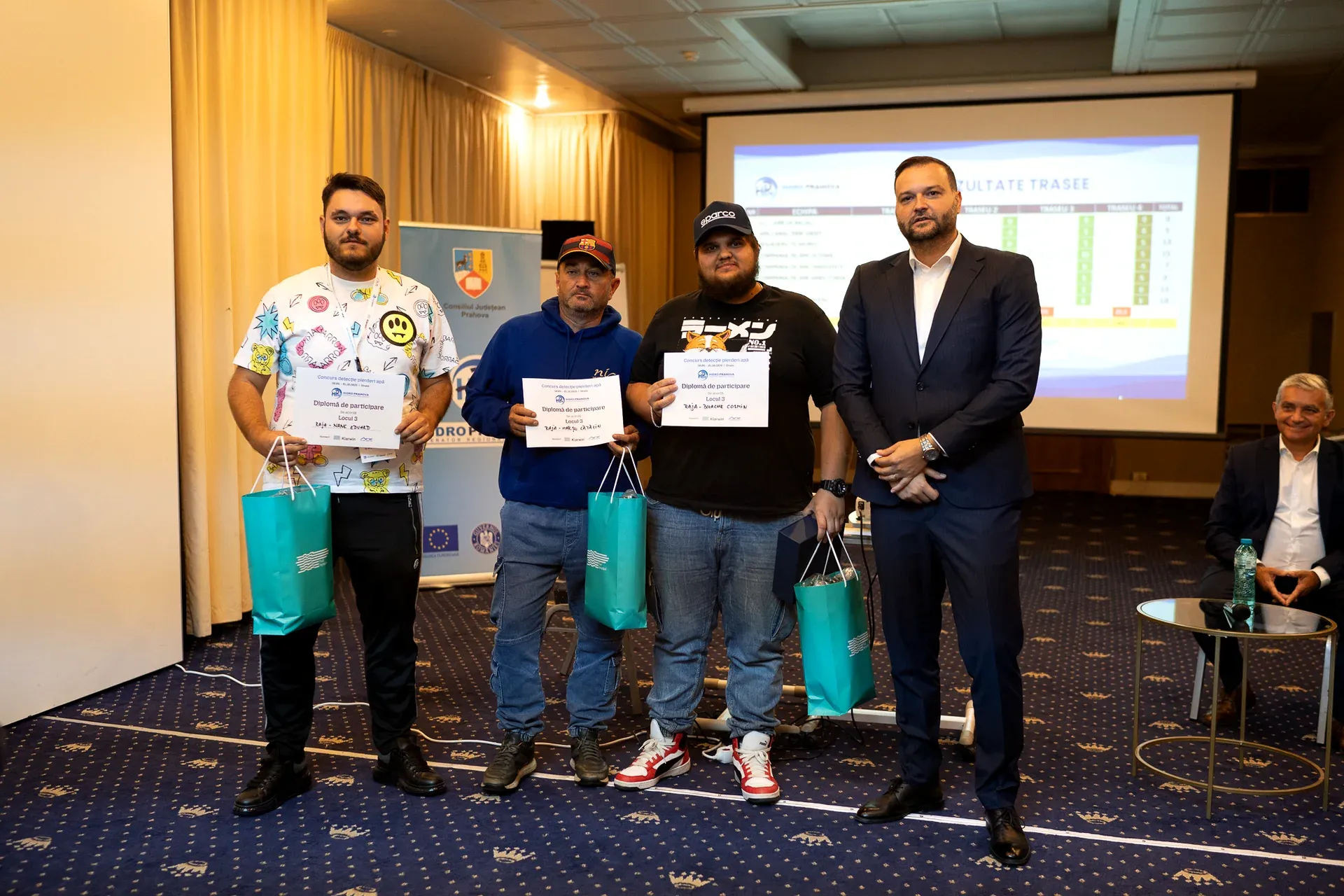 One of the teams receiving its certificate at the awards ceremony